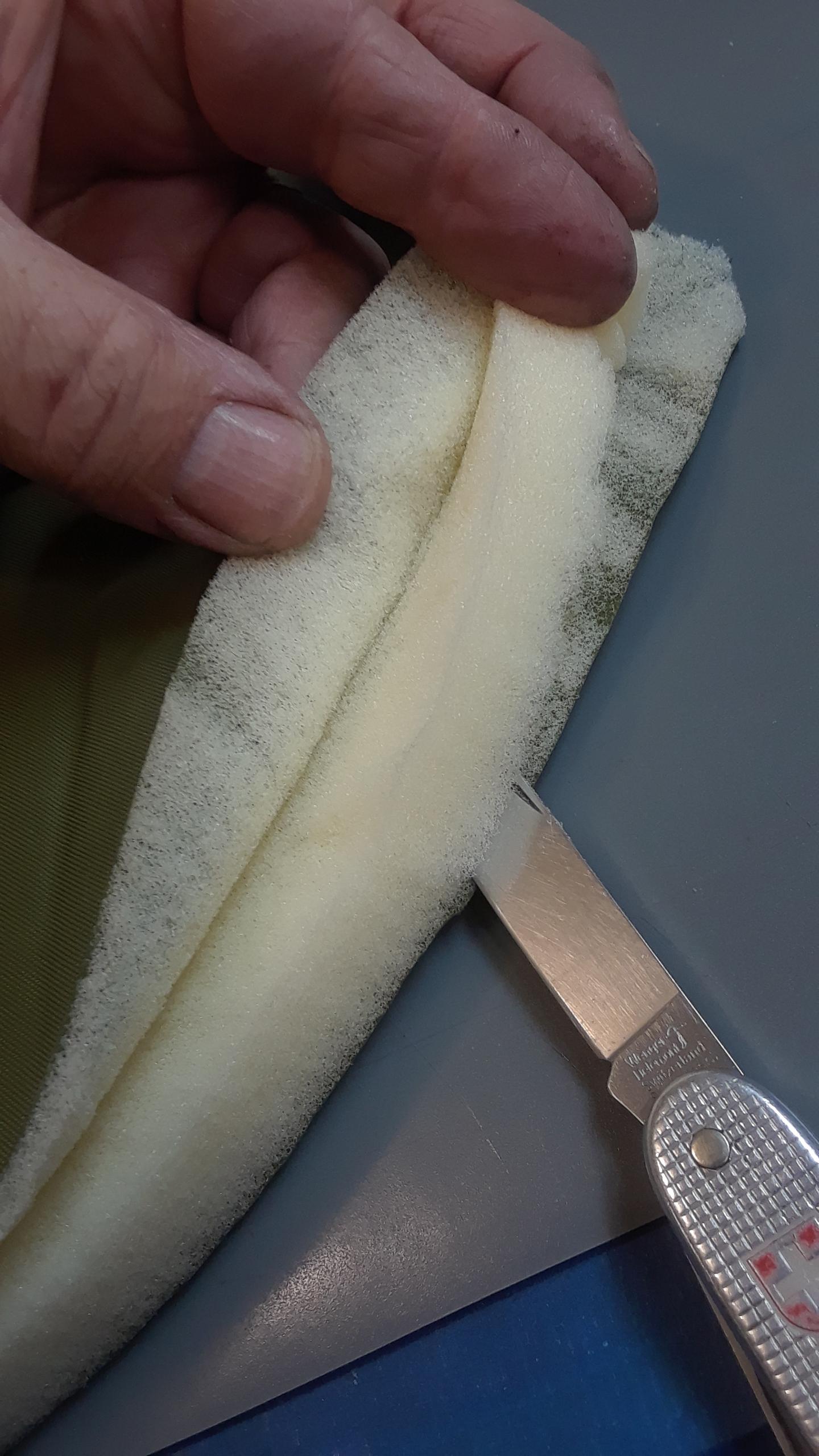 Cutting away the old foam